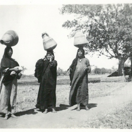 Women Balancing Water Containers
