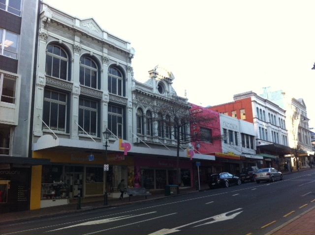 Row of shops with overhead canopies - can't see them lasting following the Canterbury earthquakes