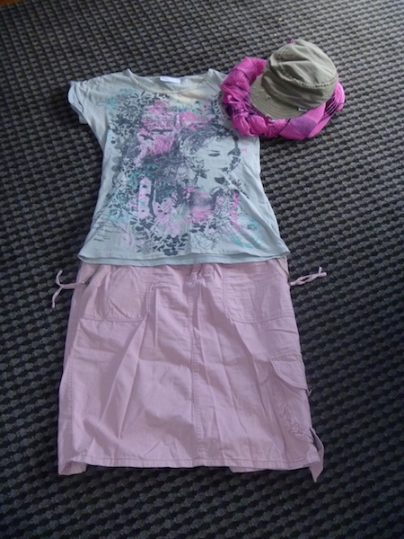 The pink skirt seems to go on just about every trip with me.  I also have the same on in grey.  But strangely enough, the pink seems to go with everything.  This time matching it with a wear-once-and-leave patterned t-shirt.  This one has a bleach stain on it but its not really too noticeable due to the pattern.  Matches great with the pink scarf and khaki hat again.