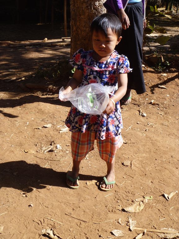This little girl was playing with this plastic bag - I missed snapping the photo of her with it over her head (yikes!)